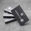 ottoron-500gsm-obsidian-void-deep-jet-black-zero-cmyk-23pt-macro-texture