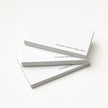Stack of OTTORON BC02 premium 500g corporate business cards showcasing Blind Deboss.