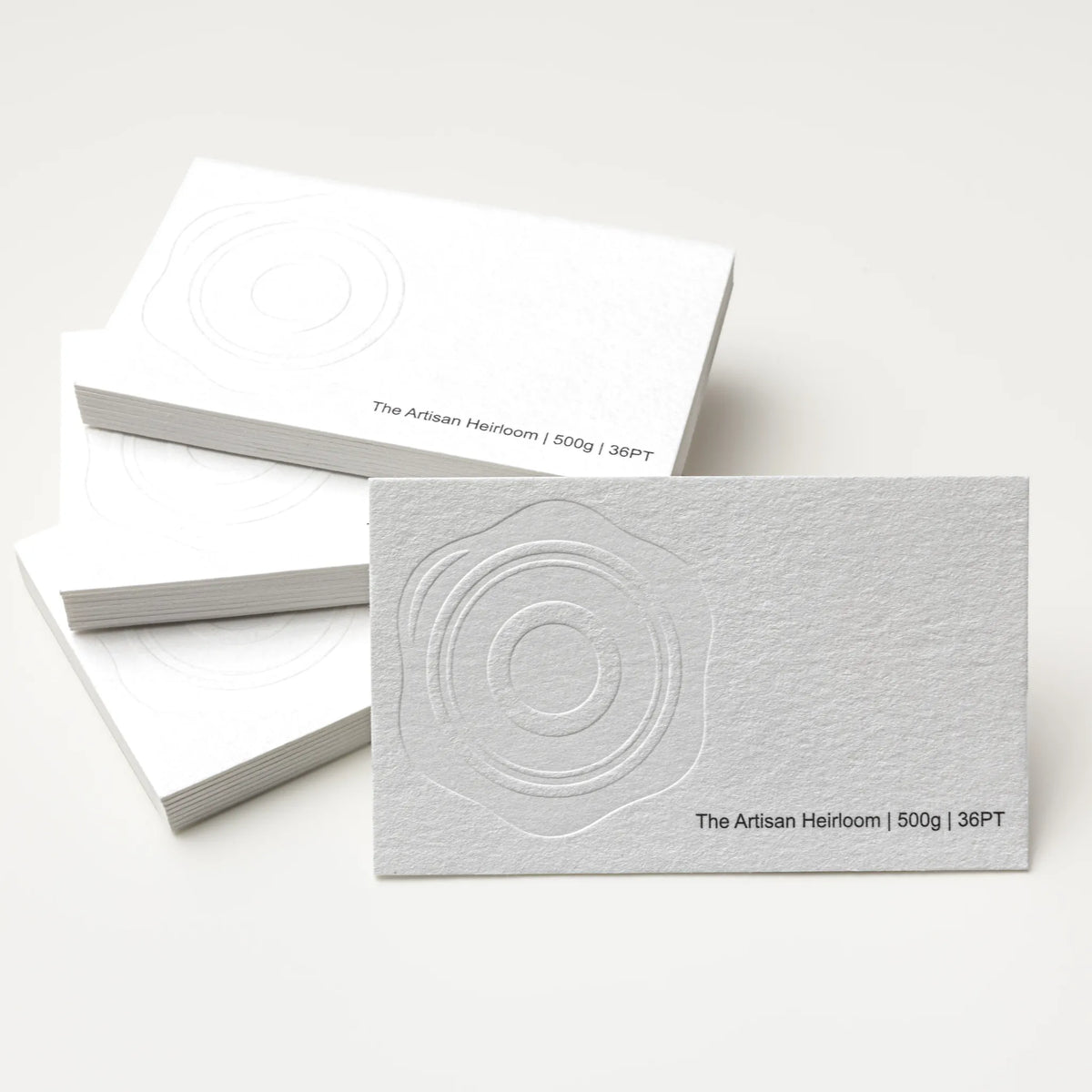 Close-up detail of The Artisan Heirloom texture on OTTORON BC02 bespoke business card highlighting Blind Deboss.