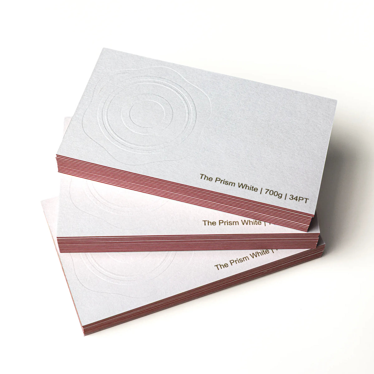 Stack of OTTORON BC03 premium 700g corporate business cards showcasing Gold Ink Print, Blind Deboss.