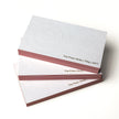 Stack of OTTORON BC03 premium 700g corporate business cards showcasing Gold Ink Print, Blind Deboss.