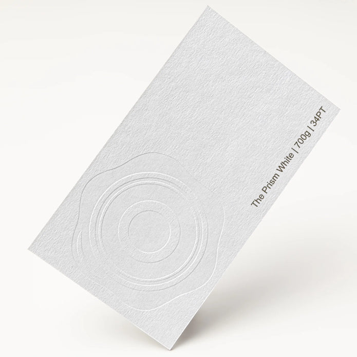 Close-up detail of The Prism White texture on OTTORON BC03 bespoke business card highlighting Gold Ink Print.