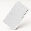 Close-up detail of The Prism White texture on OTTORON BC03 bespoke business card highlighting Gold Ink Print.