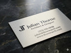OTTORON BC07 The Iron Linen - Custom 700g Linen Textured White luxury business card featuring industrial precision, Textured Letterpress finish, and premium tactile details.