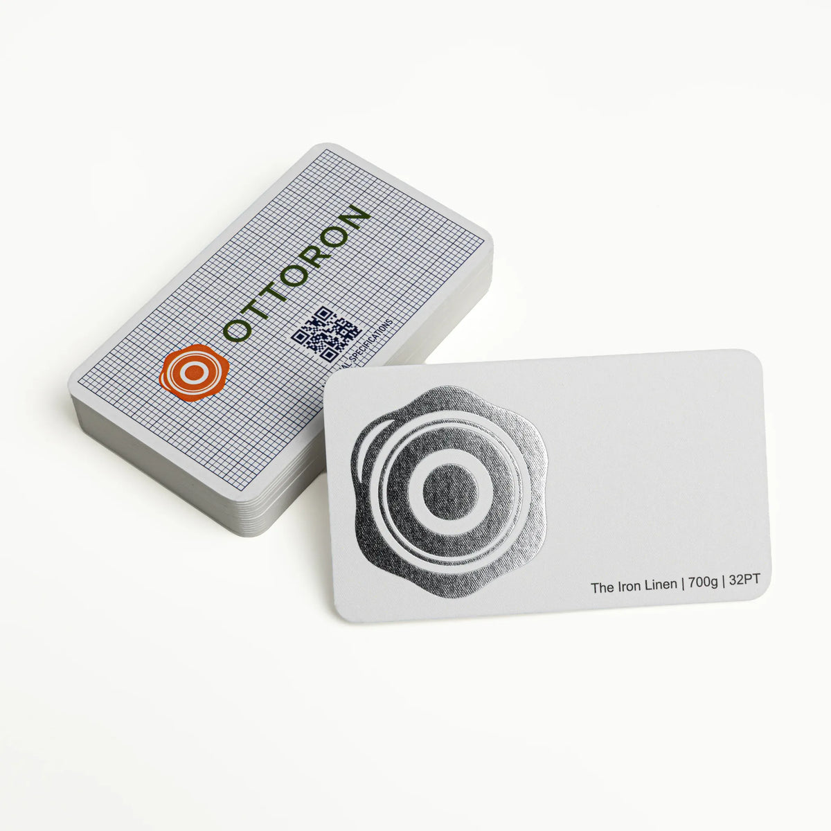 Stack of OTTORON BC07 premium 700g corporate business cards showcasing Bright Silver Foil, Round Corners.