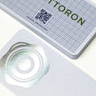Professional executive desk setting featuring the OTTORON BC09 bespoke The Glacial Peak business card.