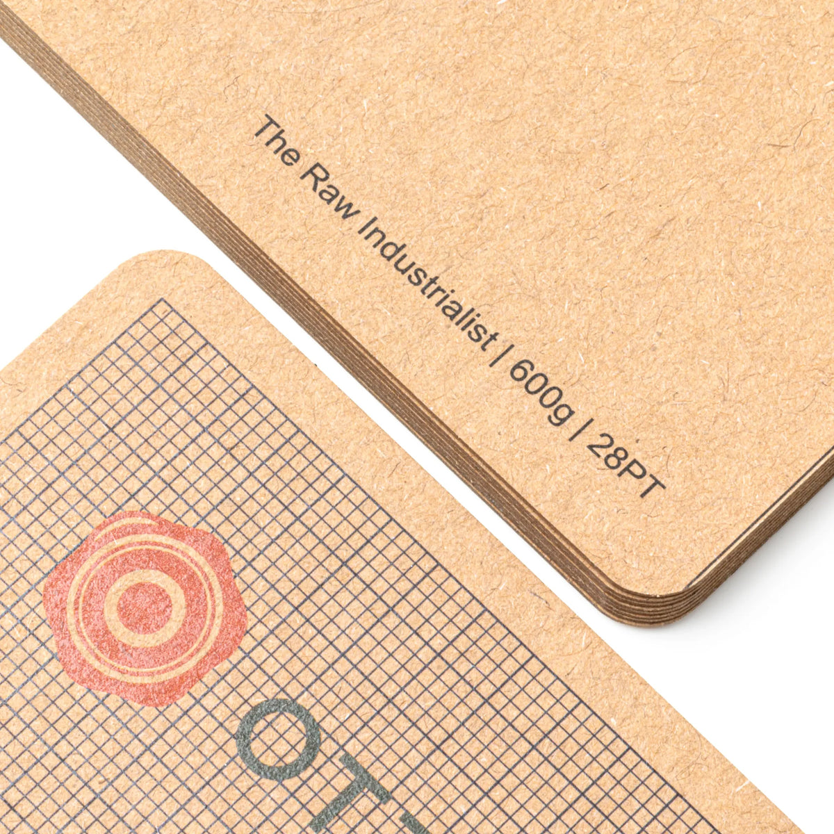 Professional executive desk setting featuring the OTTORON BC11 bespoke The Raw Industrialist business card.