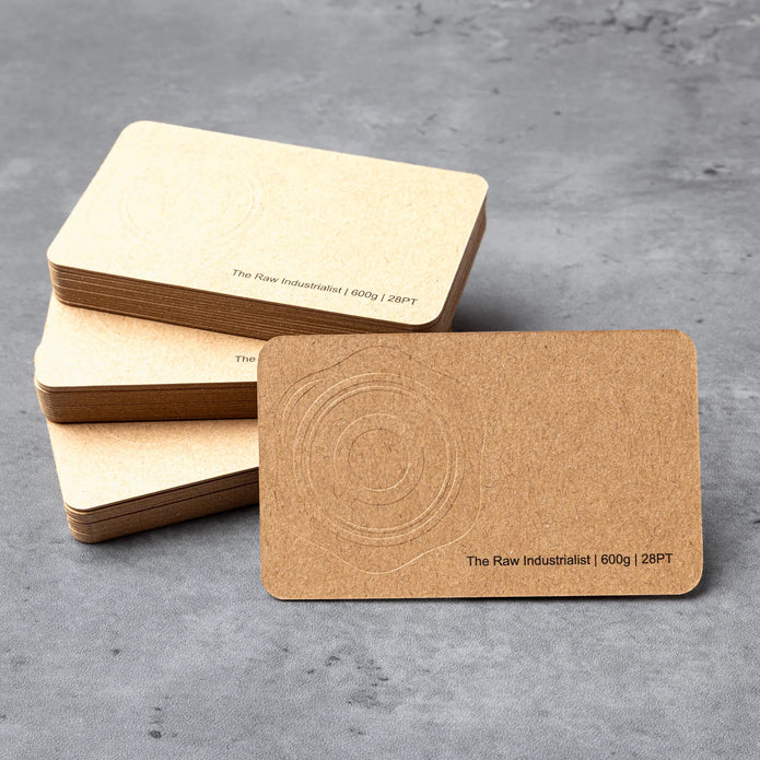 Close-up detail of The Raw Industrialist texture on OTTORON BC11 bespoke business card highlighting Blind Deboss.