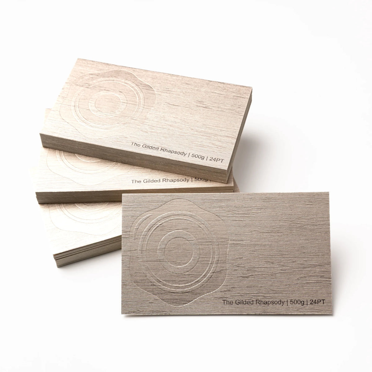 Professional executive desk setting featuring the OTTORON BC13 bespoke The Gilded Rhapsody business card.