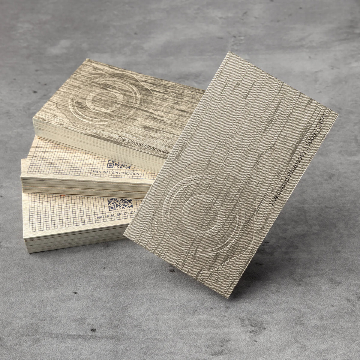 Stack oåf OTTORON BC13 premium 500g corporate business cards showcasing Blind Deboss.