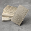 Stack oåf OTTORON BC13 premium 500g corporate business cards showcasing Blind Deboss.