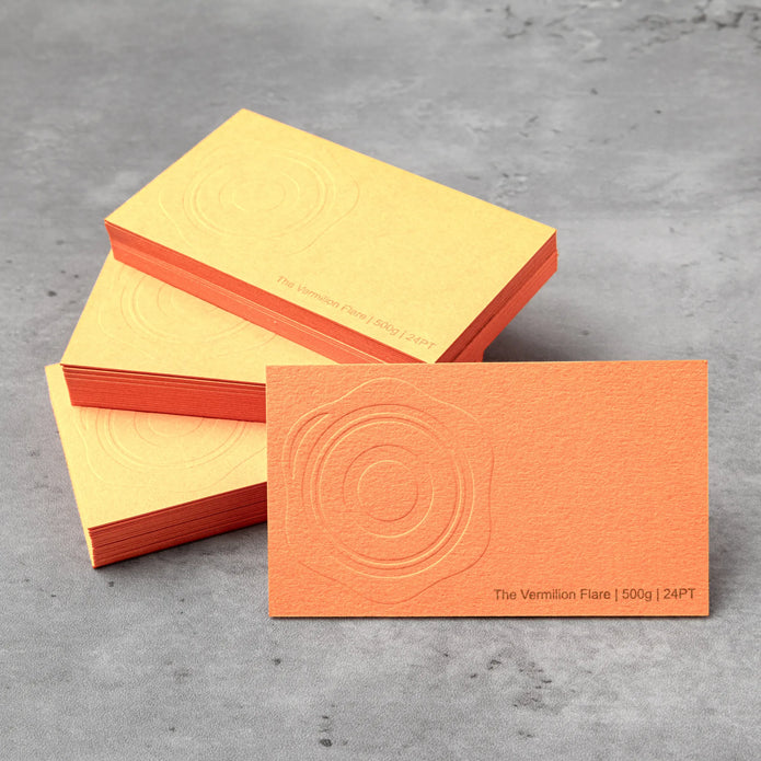 Professional executive desk setting featuring the OTTORON BC15 bespoke The Vermilion Flare business card.