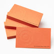 Close-up detail of The Vermilion Flare texture on OTTORON BC15 bespoke business card highlighting Gold Ink Print.