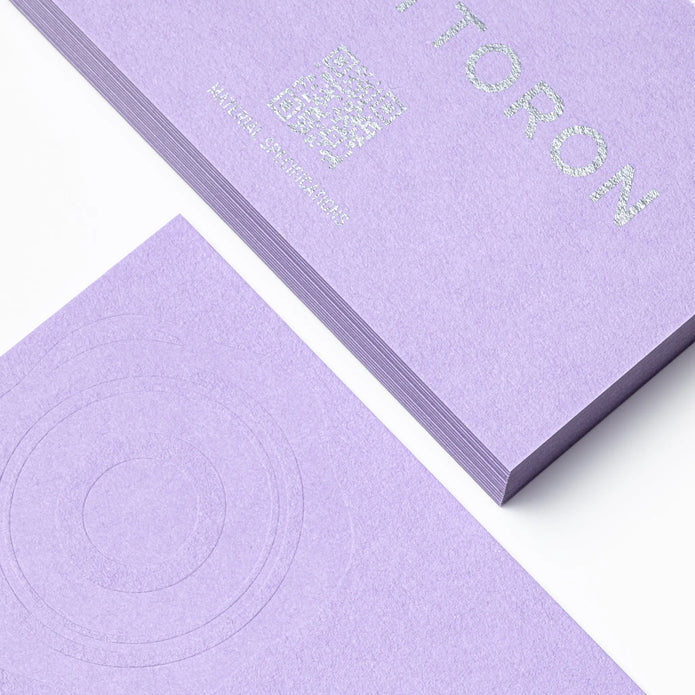 Professional executive desk setting featuring the OTTORON BC18 bespoke The Imperial Wisteria business card.