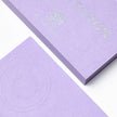 Professional executive desk setting featuring the OTTORON BC18 bespoke The Imperial Wisteria business card.