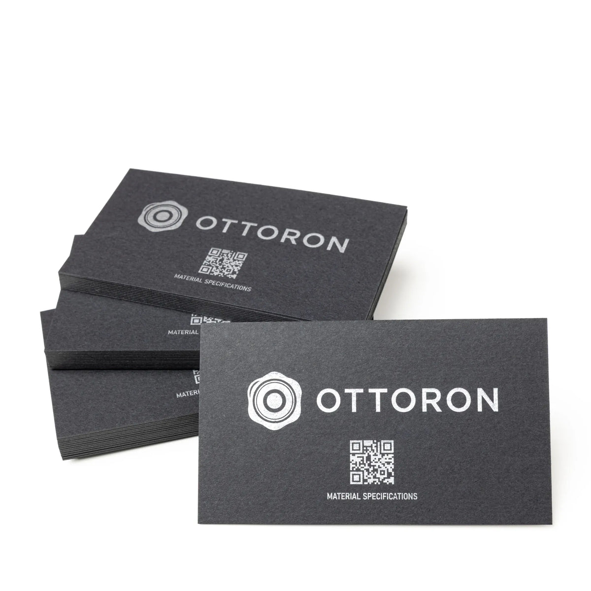 Stack of OTTORON BC20 premium 500g corporate business cards showcasing Gold Ink Print, Silver Ink Print, Blind Deboss.