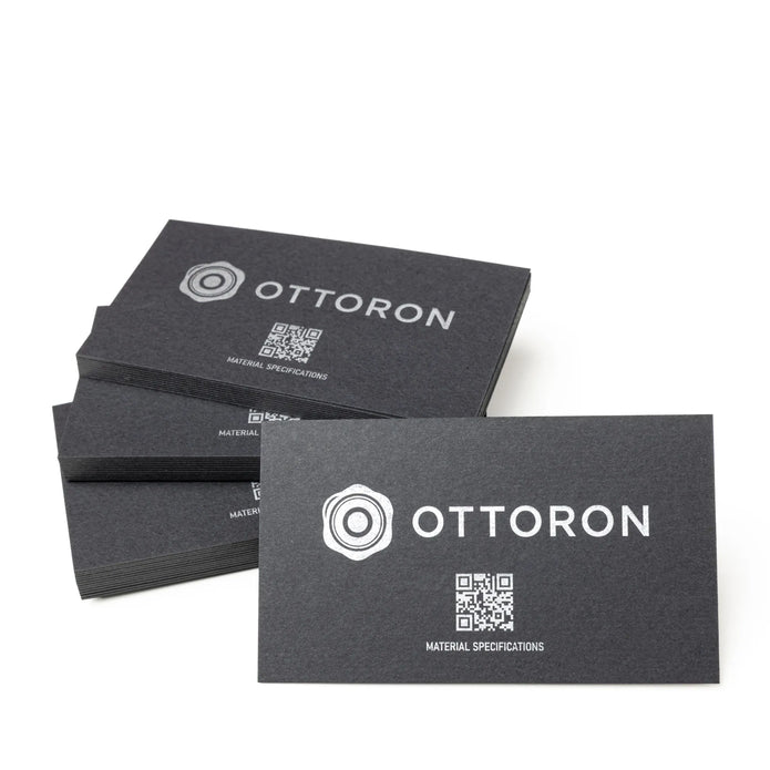 Stack of OTTORON BC20 premium 500g corporate business cards showcasing Gold Ink Print, Silver Ink Print, Blind Deboss.