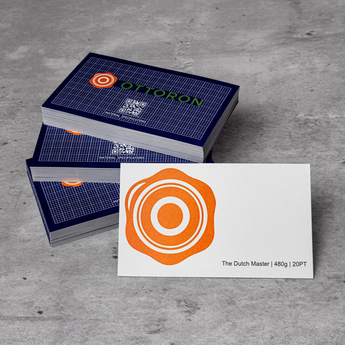 Stack of OTTORON BC21 premium 480g corporate business cards showcasing Color Deboss.