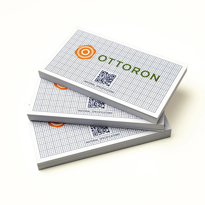 Professional executive desk setting featuring the OTTORON BC22 bespoke The Eco Architect business card.