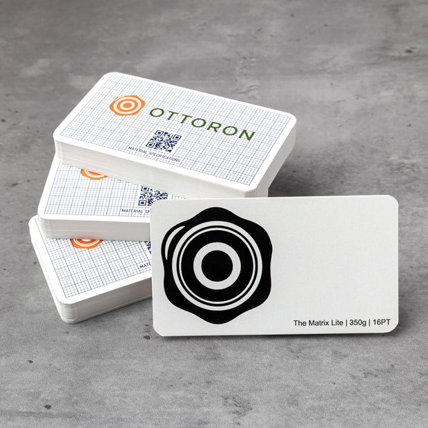 Stack of OTTORON BC23 premium 350g corporate business cards showcasing Black Foil, Round Corners, Foil Stamping.