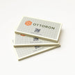 Side profile highlighting the impressive 16PT thickness of OTTORON BC24 The Antique Linen high-end cards.