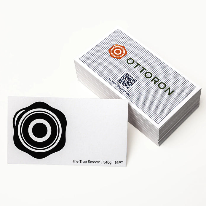 Professional executive desk setting featuring the OTTORON BC28 bespoke The True Smooth business card.