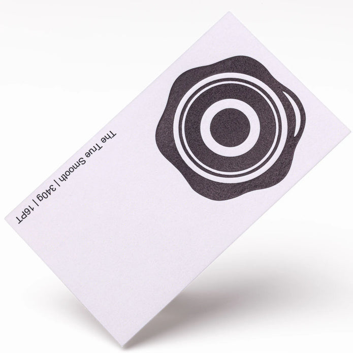 Close-up detail of The True Smooth texture on OTTORON BC28 bespoke business card highlighting Black Foil.