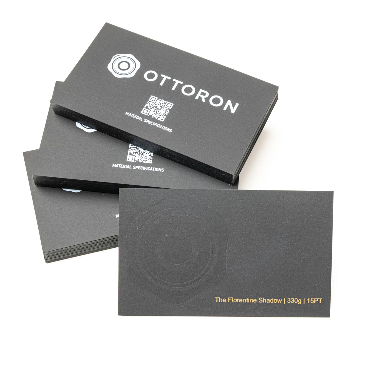 Professional executive desk setting featuring the OTTORON BC30 bespoke The Florentine Shadow business card.