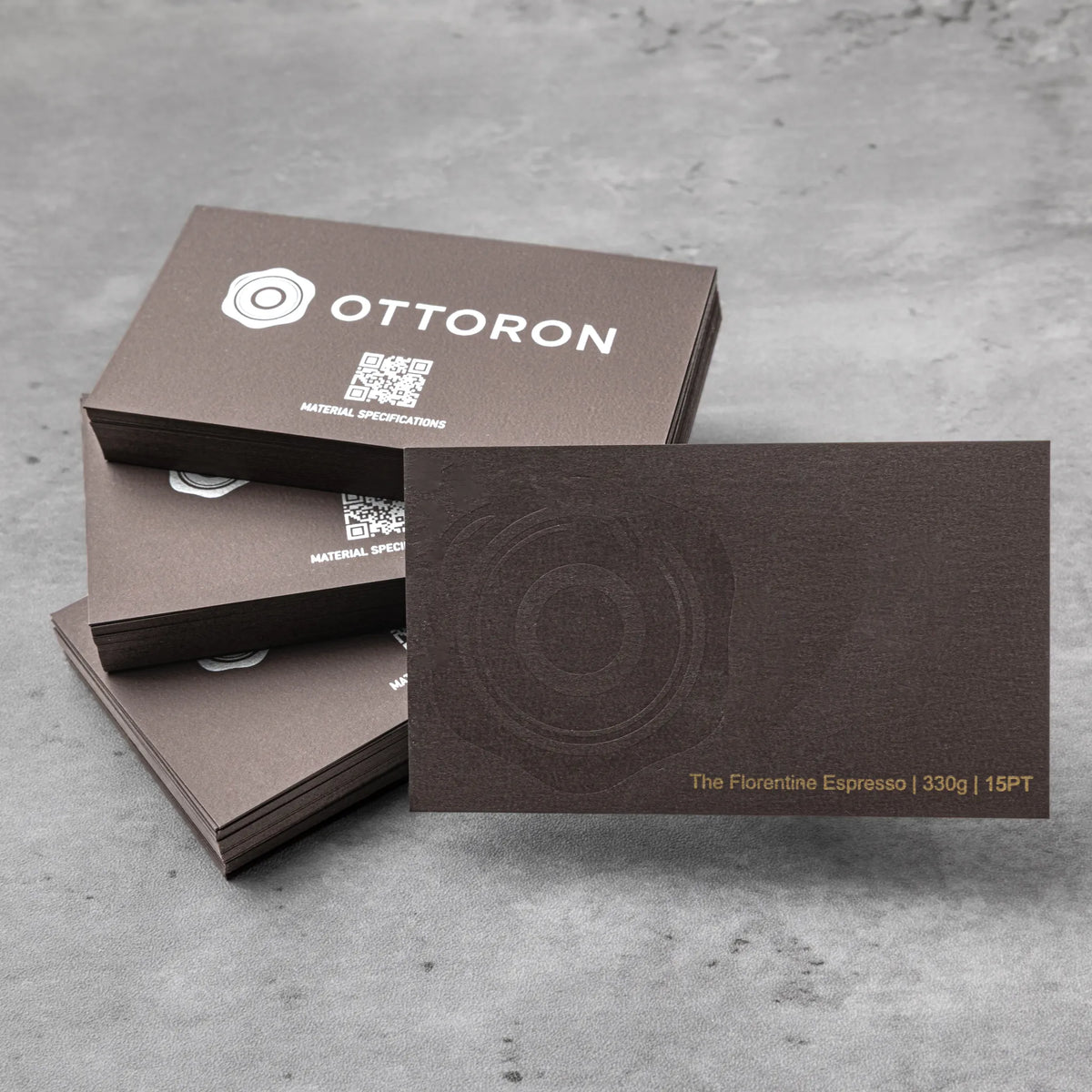 OTTORON BC31 The Florentine Espresso 330g Luxury Business Card, featuring Gold Ink Print, Silver Ink Print, Blind Deboss, front perspective view.