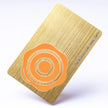 Professional executive desk setting featuring the OTTORON BC33 bespoke The Brushed Gold business card.