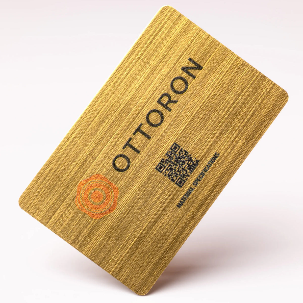 OTTORON BC33 The Brushed Gold 600g Luxury Business Card, featuring 3D Raised UV, front perspective view.