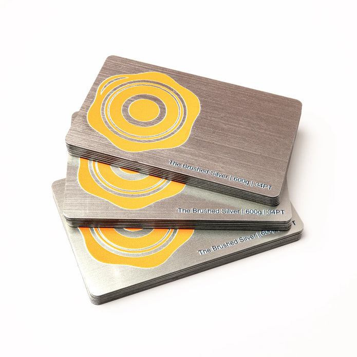 Stack of OTTORON BC34 premium 600g corporate business cards showcasing 3D Raised UV.