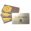 Close-up detail of The Brushed Silver texture on OTTORON BC34 bespoke business card highlighting 3D Raised UV.