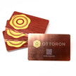 Close-up detail of The Brushed Rose Gold texture on OTTORON BC35 bespoke business card highlighting 3D Raised UV.