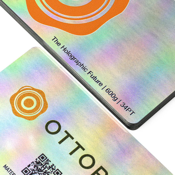 Professional executive desk setting featuring the OTTORON BC36 bespoke The Holographic Future business card.
