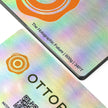 Professional executive desk setting featuring the OTTORON BC36 bespoke The Holographic Future business card.